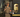 UPS driver holding a delivery scanner and envelopes
