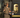 UPS driver holding a delivery scanner and envelopes