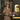 UPS driver holding a delivery scanner and envelopes