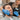 Dentist examining a smiling patient's teeth