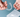 Hands holding a pair of clear aligners