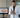 Dentist holding an intraoral scanner next to its screen