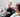 Dental assistant showing a patient a digital scan