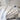 Gloved hand holding dental instruments
