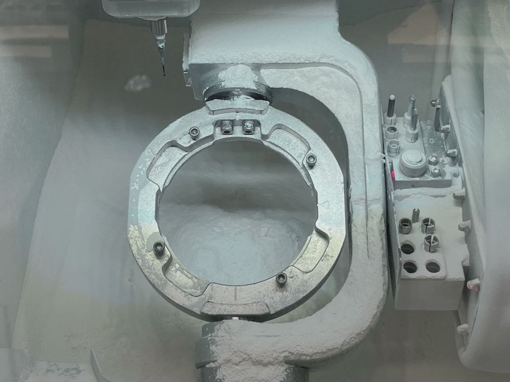 Disc holder and tool changer inside a dental milling machine